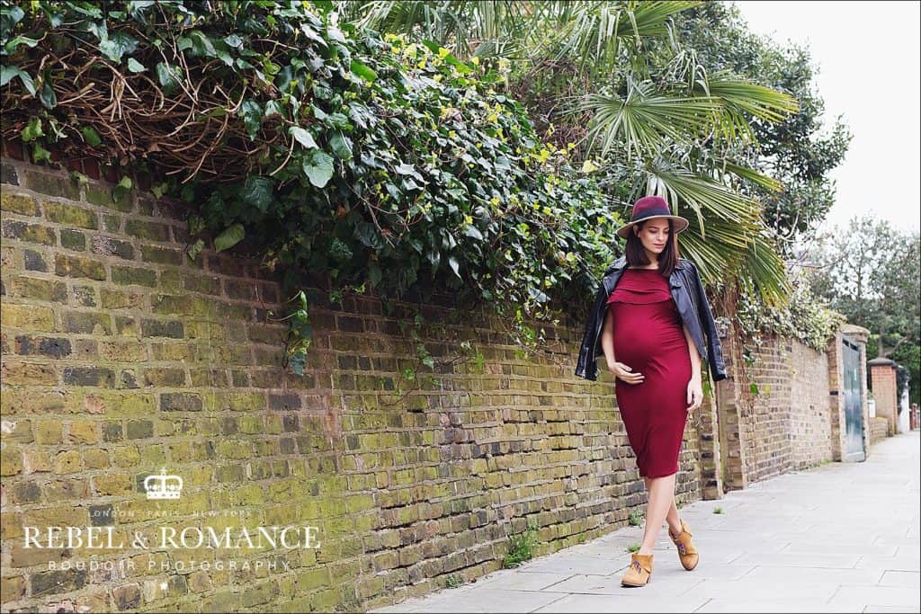 pregnant woman in red dress in london