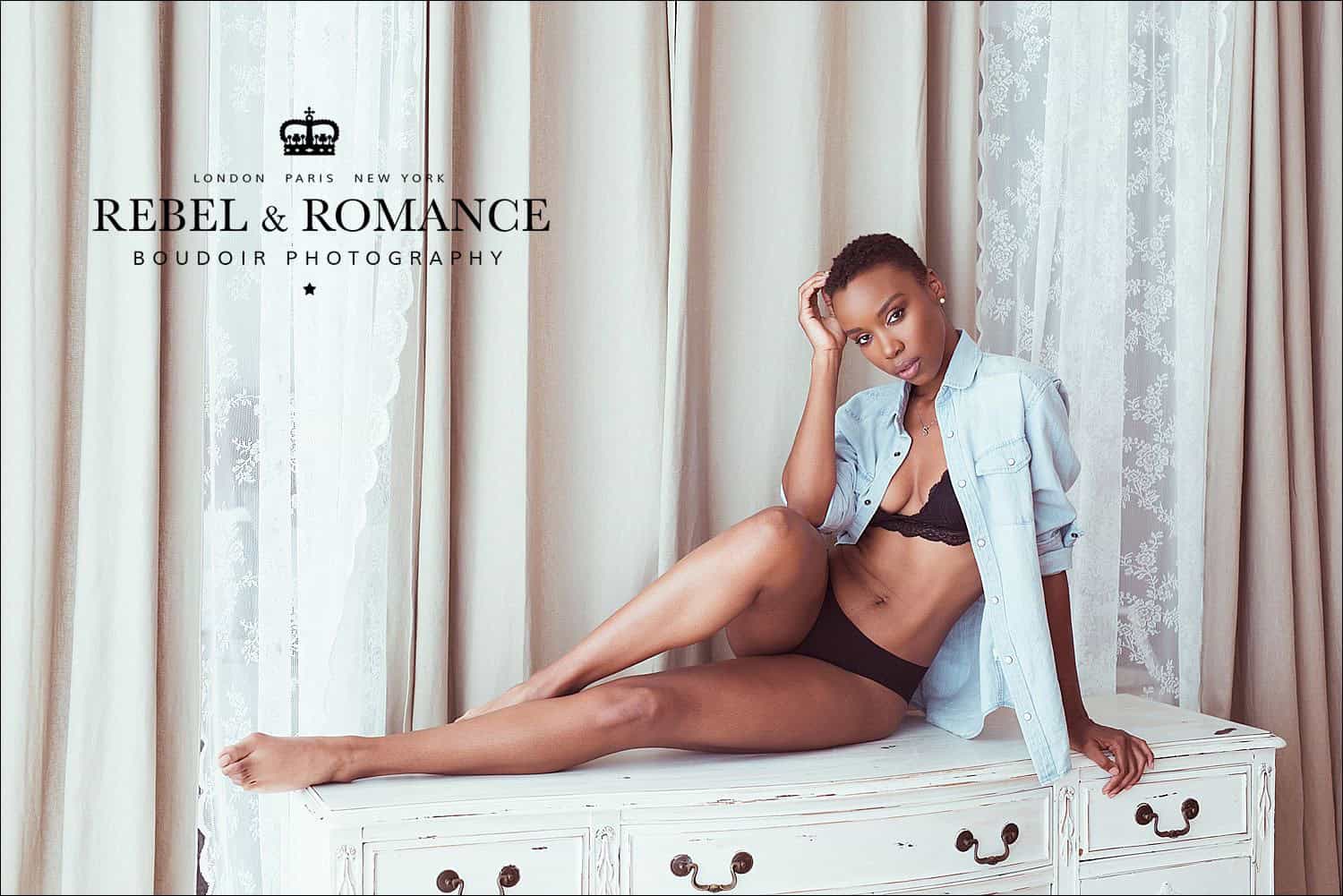 lifestyle boudoir photo shoot with black woman with a shaved head