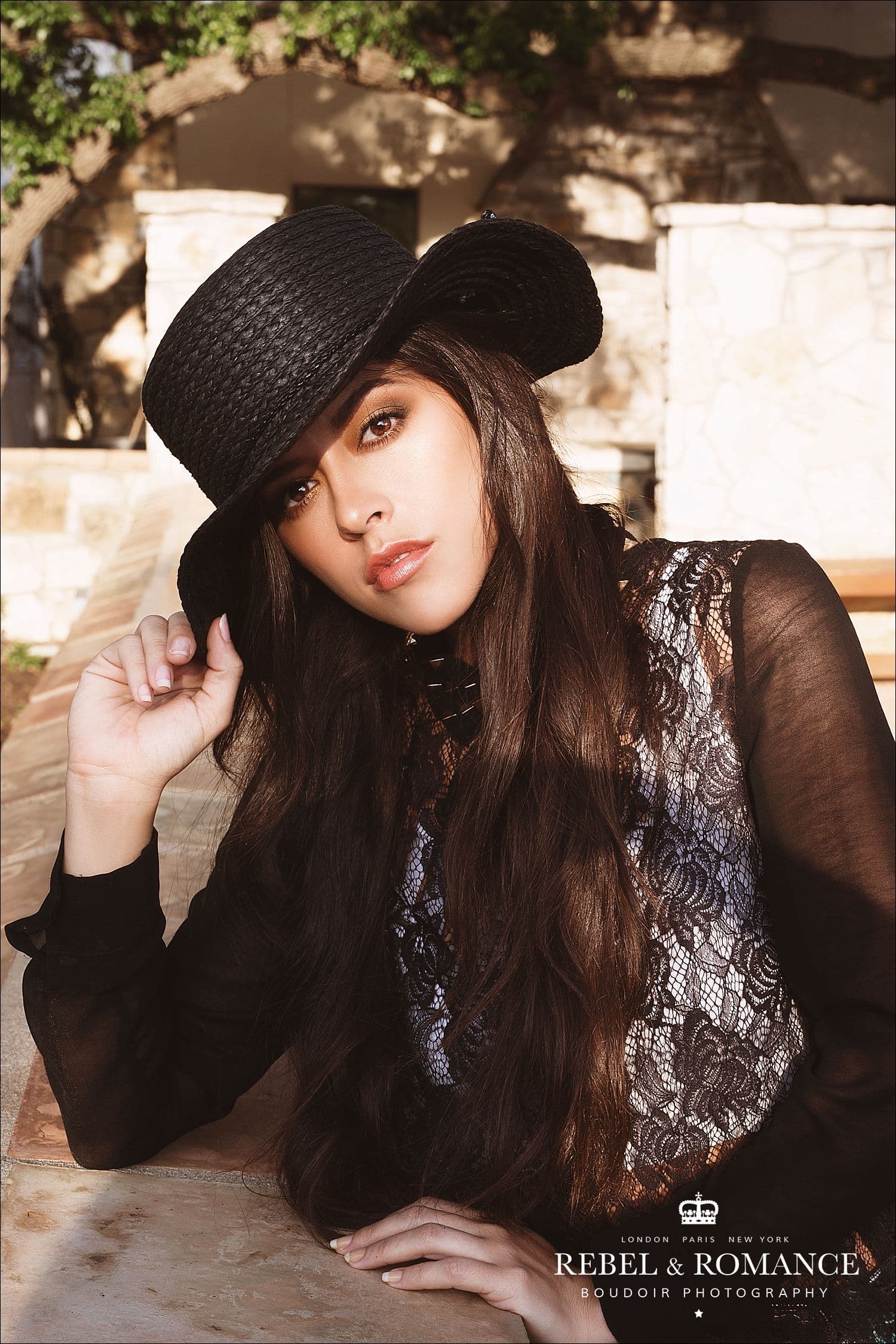 girl wearing a black hat at texas ranch