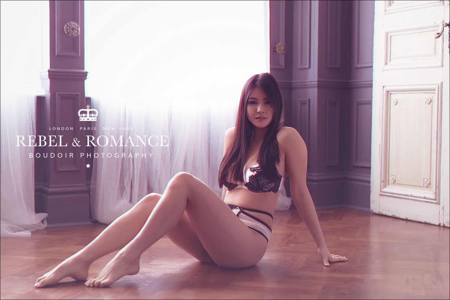 oriental woman wearing hunkemoller underwear on parquet floor in london
