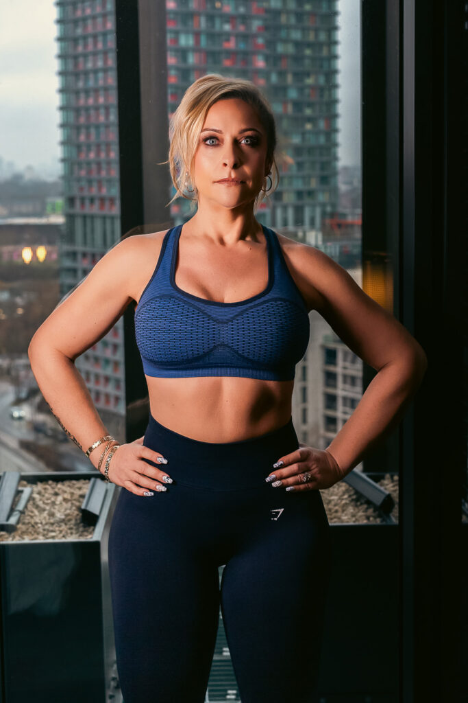 Fitness-inspired portrait celebrating strength and confidence after weight loss
