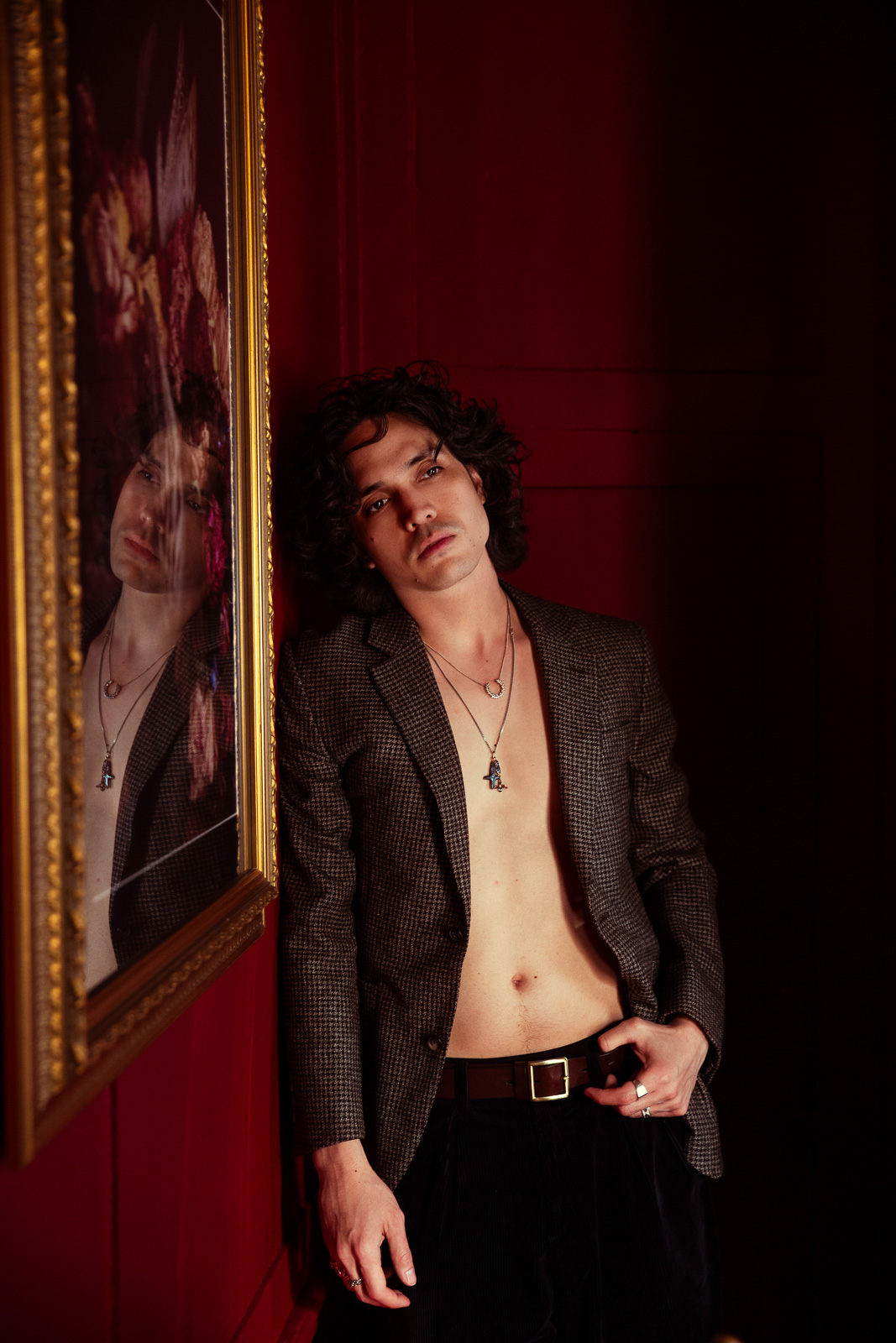 Andrew in dark suit jacket, editorial portrait during London couples photoshoot
