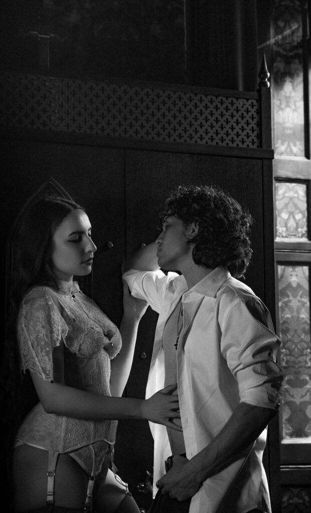 Carolina in lingerie with Andrew in white shirt, moody hotel couples session London