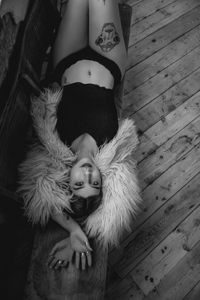 Editorial boudoir photography in a London, alternative styling with piercing and tattoos