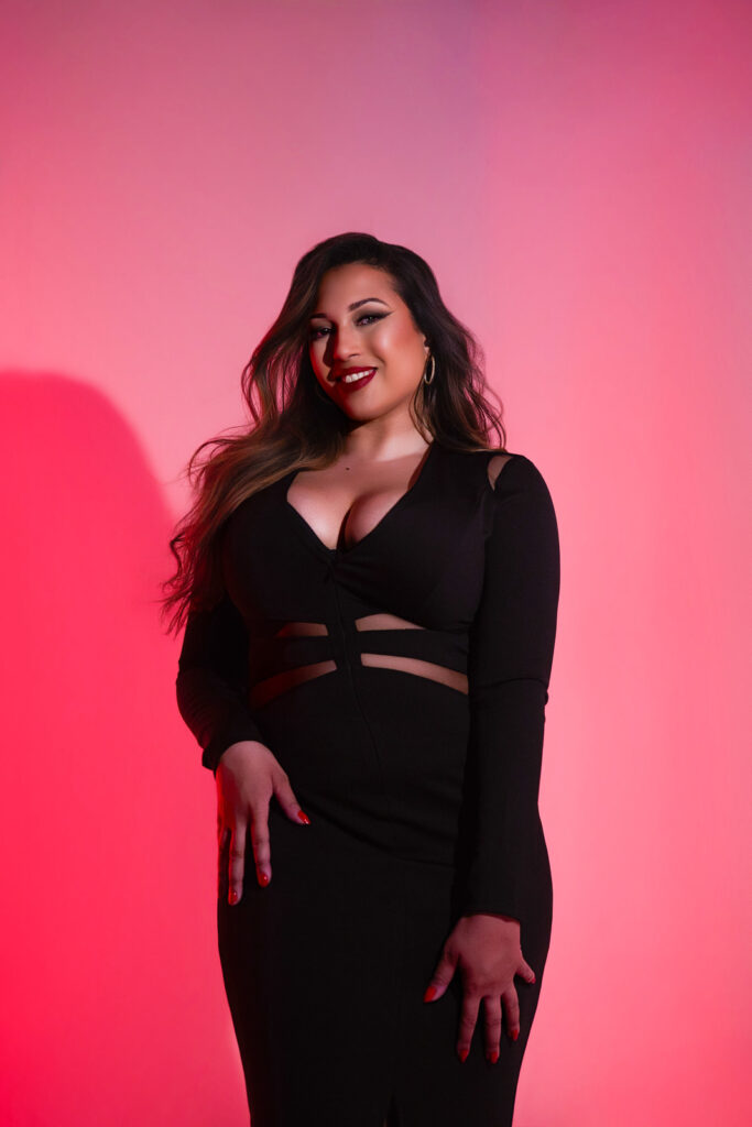 portrait with mixed lighting and pink backdrop